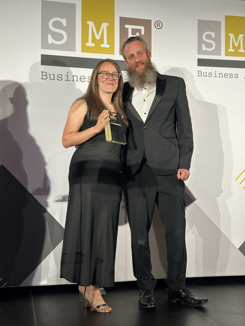 'Head Chimps' Andy and Laura receiving their awards (Image supplied) 'Head Chimps' Andy and Laura receiving their awards (Image supplied)