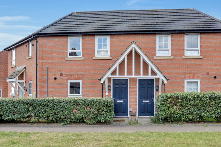 This fantastic two-bed, first-floor flat has its own dedicated private entrance. Photos: EweMove Ashby