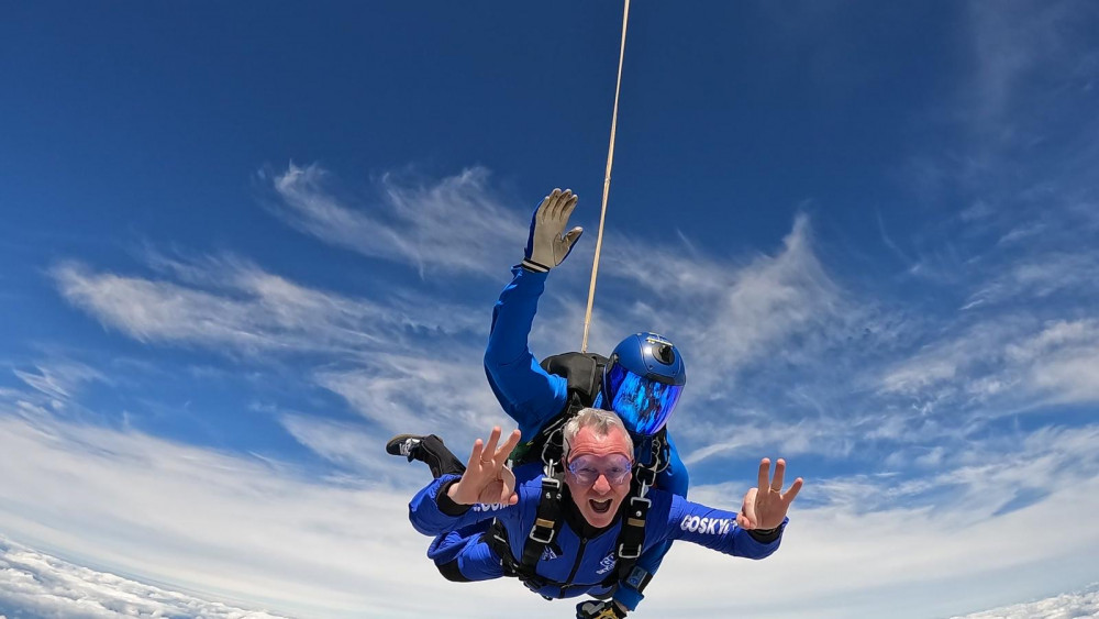 Teddington Vicar David Cloake soaring through the skies (Image supplied)
