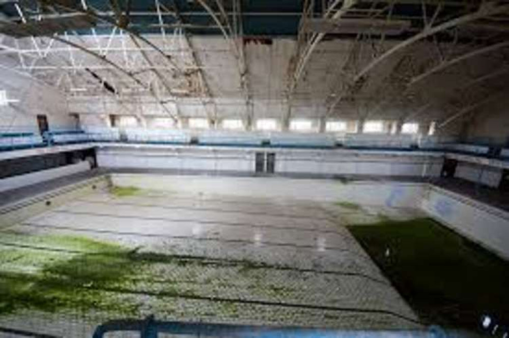 Inside the swimming pool building at Ganges