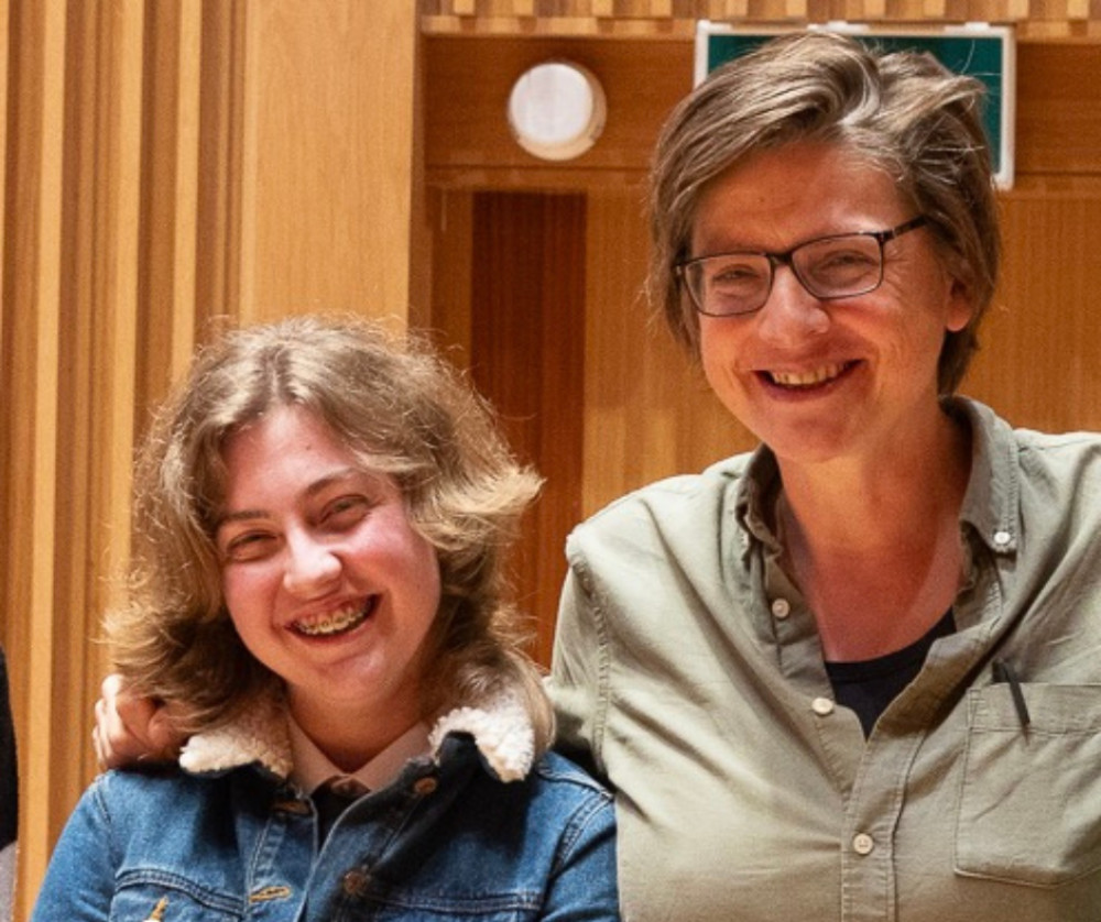 Last year’s Young Poets judge Clare Shaw with Sylvan Restrick, who won for Ode to the Dent You Left in the Sofa Cushions. (Supplied) 