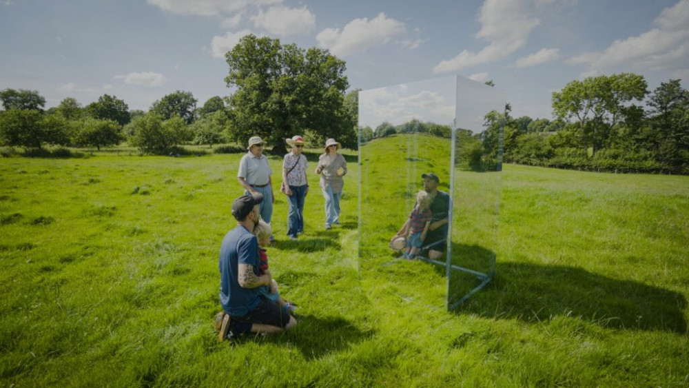 Glastonbury Tor will host Mirrorbox on 18 June, sharing stories from people too ill to make the climb themselves. Glastonbury Tor will host Mirrorbox on 18 June, sharing stories from people too ill to make the climb themselves.
