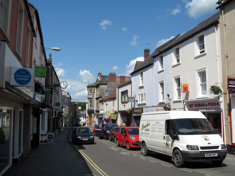 Shepton Mallet thrives with a strong work ethic, solid housing, and local roots, but faces challenges in transport and higher education access.