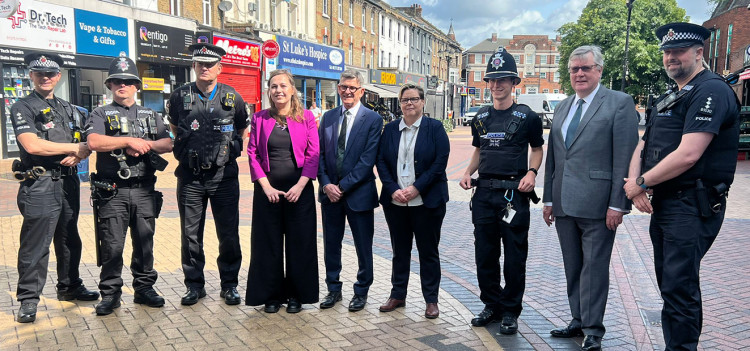 Today's walkabout on Grays High Street included police officers and civic leaders.