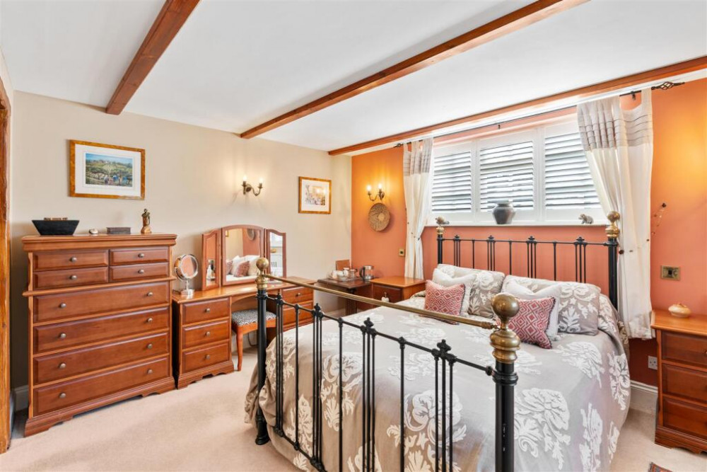 One of the six bedrooms (Credit: Holden & Prescott) One of the six bedrooms (Credit: Holden & Prescott)
