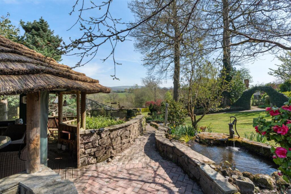 Breeze house overlooking the pond (Credit: Holden & Prescott) Breeze house overlooking the pond (Credit: Holden & Prescott)