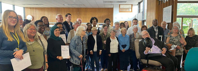 Cllr Steve Liddiard with volunteers at Chadwell library. 