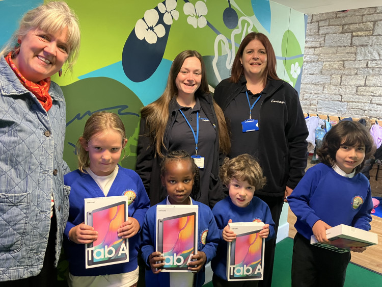 Head Teacher Kerry Devane (left) and pupils with D2A staff member Sian Hitchcock (centre) and D2A Registered Manager Sarah Perry (right).