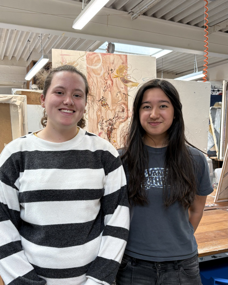Blue School students Elizabeth Adams and Gabriella Unciano