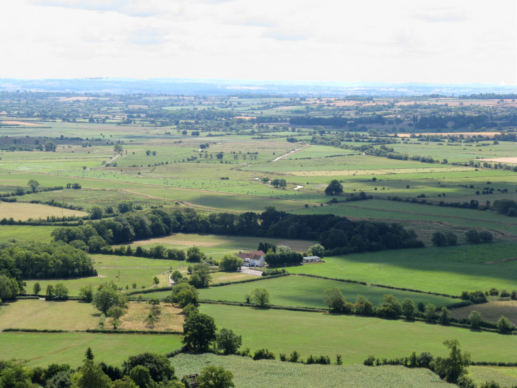 Somerset mirrors the national average but faces challenges in income, digital access, and school attendance, with some positive business and health strides.