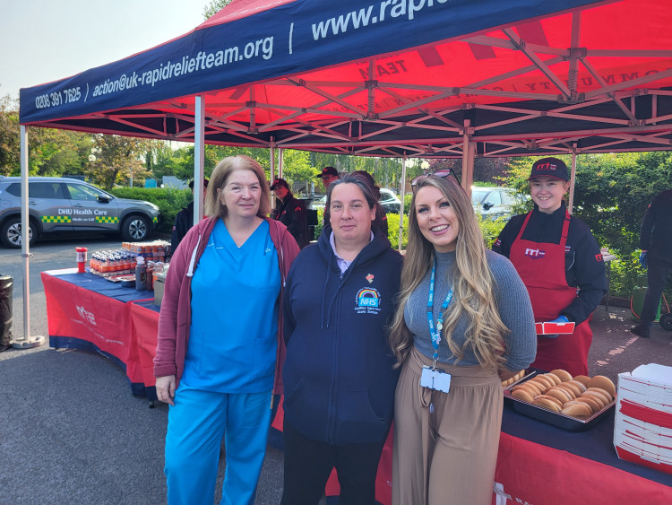 Team members from Rutland Memorial Hospital being served food from RRT volunteer team