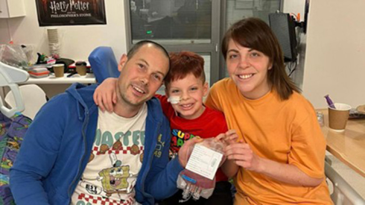 Jasper with dad Matt and mum Sophie.