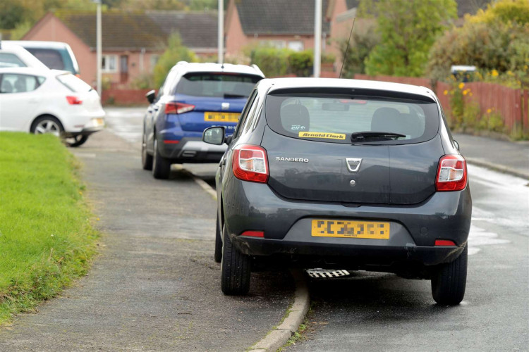 Wells police warn drivers as increased pavement parking endangers pedestrians and damages infrastructure.