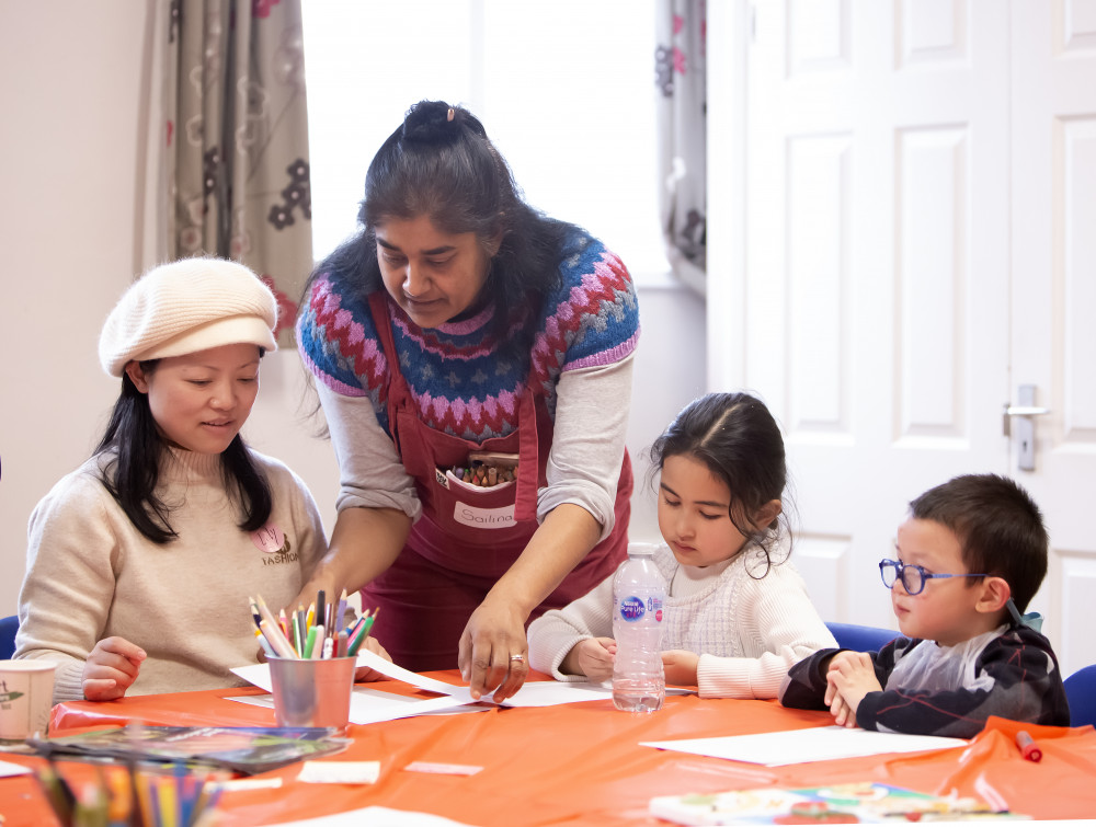 Family, friends and artists make art together at Together Create Family, friends and artists make art together at Together Create