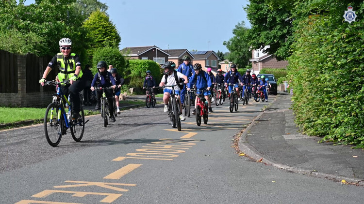 Police joined Congleton children for their cycle to school (Credit: Cheshire Police)