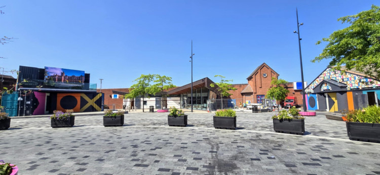 New permanent exhibition boards are being installed at Crewe's Lyceum Square (Ly2), the last element to complete the £750,000 plus town centre development (Ryan Parker).