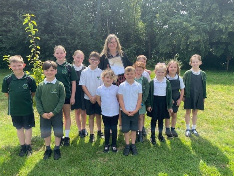 Mrs Woollam holding her headteacher of the year award. (Photo: The Cornovii Trust)