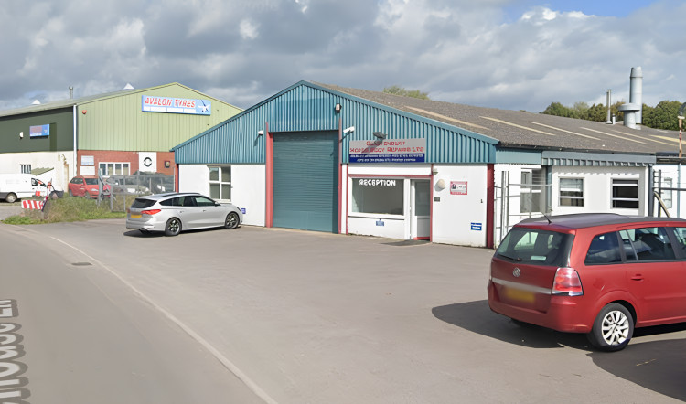 The Glastonbury Motor Repairs site gets green light for demolition, paving way for redevelopment.