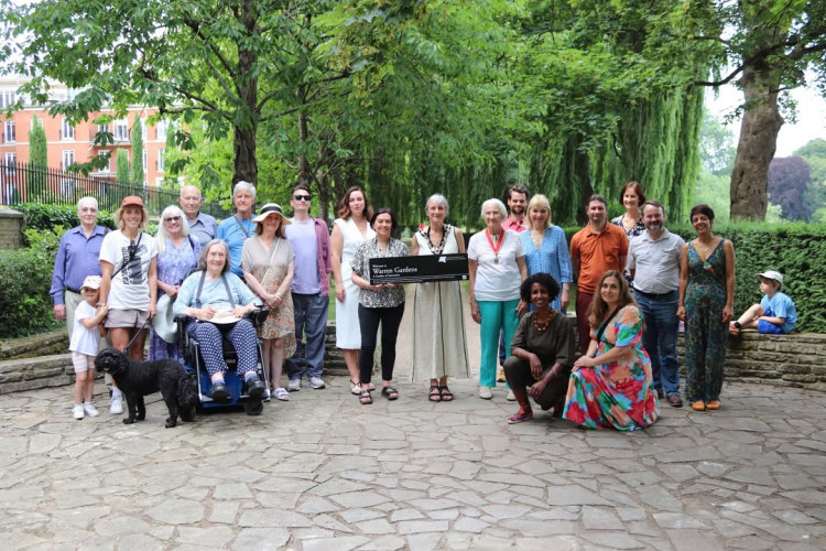 Deputy Mayor Cllr Clare Vollum joins members of Richmond’s community to unveil the new ‘Garden of Sanctuary’ stone at Warren Gardens (credit: Richmond Council).