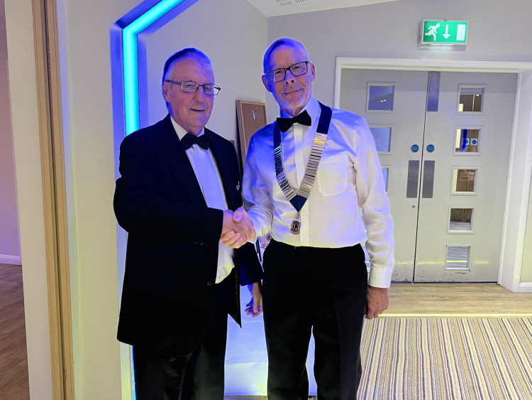 Outgoing Rutland Lions president Paul Mills congratulates Allan Grey in taking over the role (Photo: LCR)