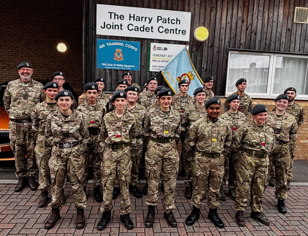 The Wells ATC cadets with Flight Lieutenant John Blackburn on the left and Flight Lieutenant Tom Henson on the right                               