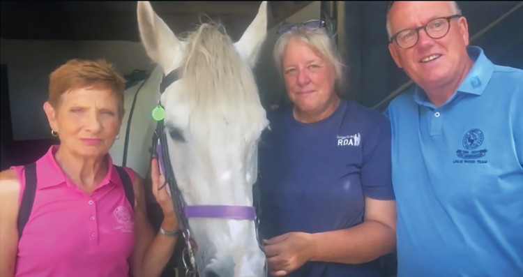 Val Mathewson, Carleen Dallas and Mike Ashton with 'Del Boy' one of the stars of Sugarloaf RDA.