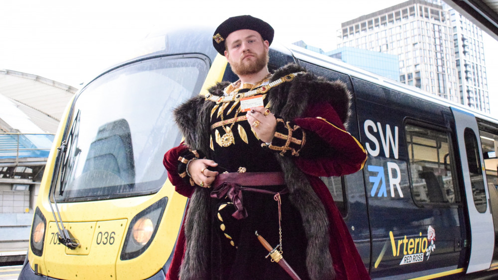 Henry VIII travelled to Hampton Court Palace's Garden Festival on an SWR train from London Waterloo (Credit: South Western Railway)