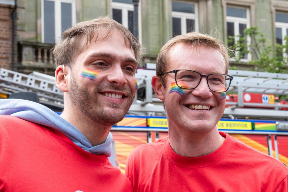 Tim Roca (right) has been speaking on the continued importance of Pride ahead of MaccPride 2025 (Credit: Brendan McPhillips and Irene Lea)