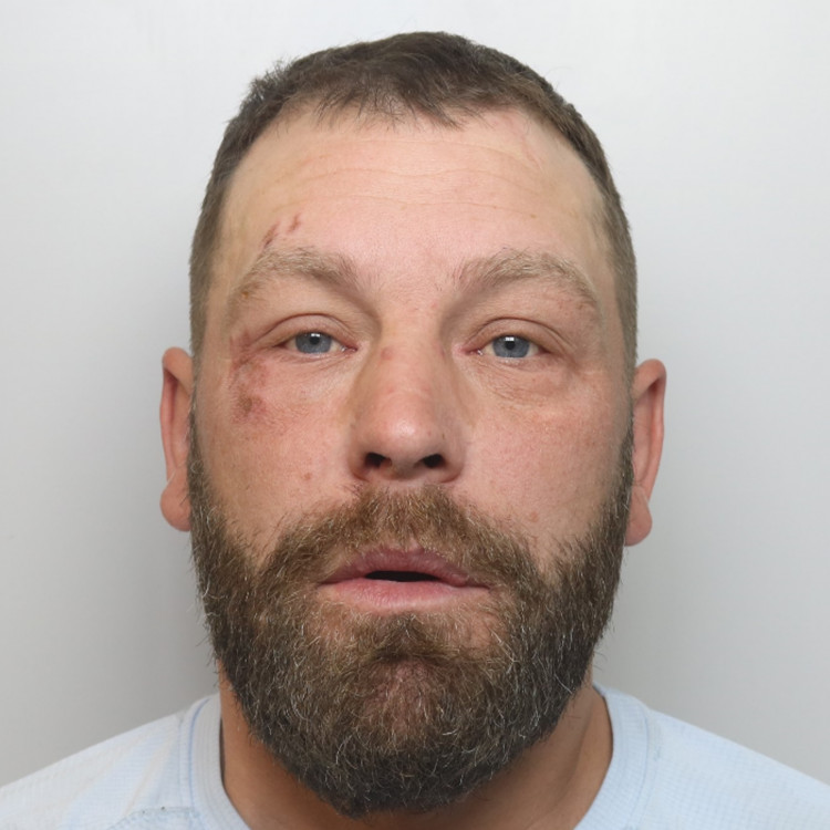 Davies is described as white 5'5" tall, with mousey brown hair and blue eyes (Image via: Cheshire Constabulary)
