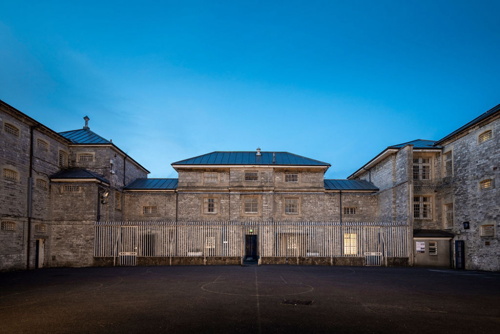 The iron gates at Shepton Mallet Prison are closing once again – but this time, the inmates are CEOs, consultants and councillors from across Somerset and Dorset. It’s all part of Jail or Bail, a tongue-in-cheek challenge to raise cash for Dorset and Somerset Air Ambulance – and this year’s line-up of unlucky “prisoners” has just 24 hours to secure their release. Their crimes? Questionable office habits, chocolate-related offences and a suspicious fondness for cheese. The punishment? A night in Britain’s oldest prison, complete with gruelling chores, ghost tours and escape rooms. Each inmate has been handed a bail target of £800 – and they’ll need the public’s help to raise it if they want out. Leading the charge is Charles Hackett, chief executive of the air ambulance charity itself – banged up for “being way too choosy about the office tea.” Joining him are: Helen Haxell, principal consultant at AxeSharp Communications – “Loves ghosts by day, terrified by them at night.” Jason Fewell, engineering boss at Wyke Farms – charged with “cheese theft, drink smuggling and DJ-ing disasters.” Mark Bolton, principal of Yeovil College – “Too energetic and helpful – makes the rest of us look bad.” Joseph Hughes and Mark Chugg from Greenslade Taylor Hunt – guilty of “too much sarcasm” and “mug drama.” Paul Dunlop, Blanchards Bailey LLP – “Being a lawyer – say no more.” David Crew, Somerset Chamber of Commerce – “Office chocolate hat neglect.” Cllr David Woan, Somerset Council – “Excessive enthusiasm.” The event kicks off on Thursday 10 July, and from midday, the nine will be locked inside Shepton’s infamous slammer until they hit their bail target. The public are being urged to chip in, cheer them on, or share their story online to help the group hit their fundraising goal – and escape the cellblock. The Dorset and Somerset Air Ambulance team will be sharing updates as the drama unfolds – including footage of chores, ghost hunting and prison life – so get ready to follow along on social media. Because while the crimes might be fake, the cause is very real – and every penny raised helps keep this vital emergency service in the air. The iron gates at Shepton Mallet Prison are closing once again – but this time, the inmates are CEOs, consultants and councillors from across Somerset and Dorset. It’s all part of Jail or Bail, a tongue-in-cheek challenge to raise cash for Dorset and Somerset Air Ambulance – and this year’s line-up of unlucky “prisoners” has just 24 hours to secure their release. Their crimes? Questionable office habits, chocolate-related offences and a suspicious fondness for cheese. The punishment? A night in Britain’s oldest prison, complete with gruelling chores, ghost tours and escape rooms. Each inmate has been handed a bail target of £800 – and they’ll need the public’s help to raise it if they want out. Leading the charge is Charles Hackett, chief executive of the air ambulance charity itself – banged up for “being way too choosy about the office tea.” Joining him are: Helen Haxell, principal consultant at AxeSharp Communications – “Loves ghosts by day, terrified by them at night.” Jason Fewell, engineering boss at Wyke Farms – charged with “cheese theft, drink smuggling and DJ-ing disasters.” Mark Bolton, principal of Yeovil College – “Too energetic and helpful – makes the rest of us look bad.” Joseph Hughes and Mark Chugg from Greenslade Taylor Hunt – guilty of “too much sarcasm” and “mug drama.” Paul Dunlop, Blanchards Bailey LLP – “Being a lawyer – say no more.” David Crew, Somerset Chamber of Commerce – “Office chocolate hat neglect.” Cllr David Woan, Somerset Council – “Excessive enthusiasm.” The event kicks off on Thursday 10 July, and from midday, the nine will be locked inside Shepton’s infamous slammer until they hit their bail target. The public are being urged to chip in, cheer them on, or share their story online to help the group hit their fundraising goal – and escape the cellblock. The Dorset and Somerset Air Ambulance team will be sharing updates as the drama unfolds – including footage of chores, ghost hunting and prison life – so get ready to follow along on social media. Because while the crimes might be fake, the cause is very real – and every penny raised helps keep this vital emergency service in the air.