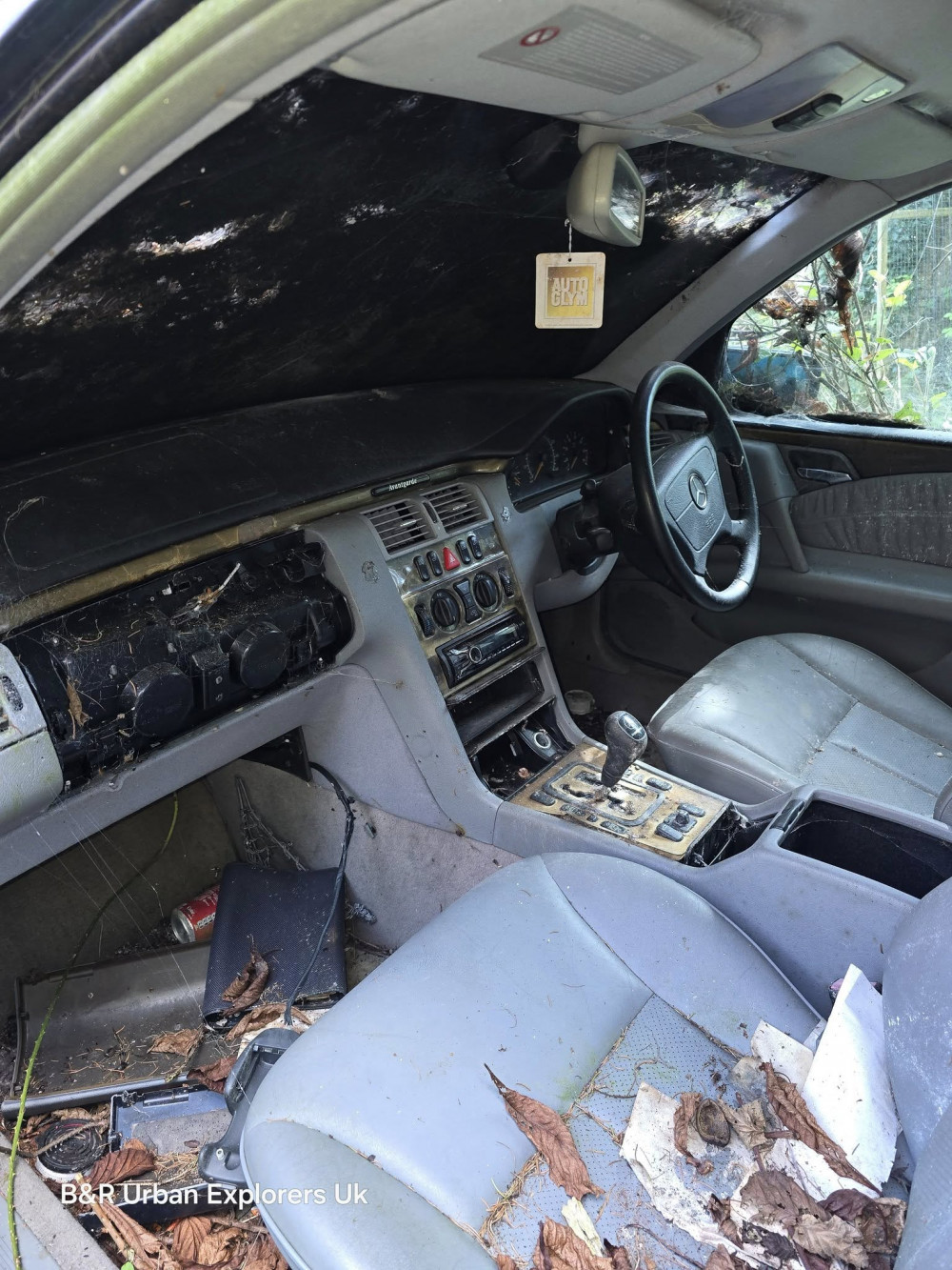 A Mercedes was left outside the mansion (Credit: B&R Urban Explorers) A Mercedes was left outside the mansion (Credit: B&R Urban Explorers)