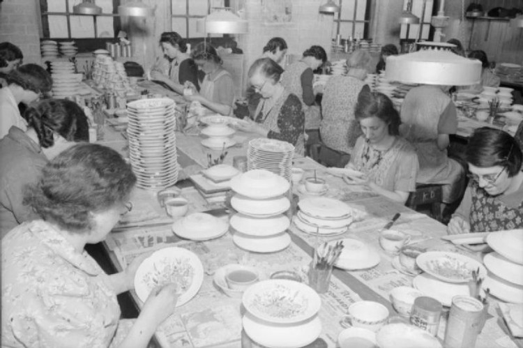 The decorating shop at the J & G Meakin factory in Hanley, showing women at work painting intricate enamel designs on plates before they are glazed. The plates were due for export to South America. (Wikimedia Commons)