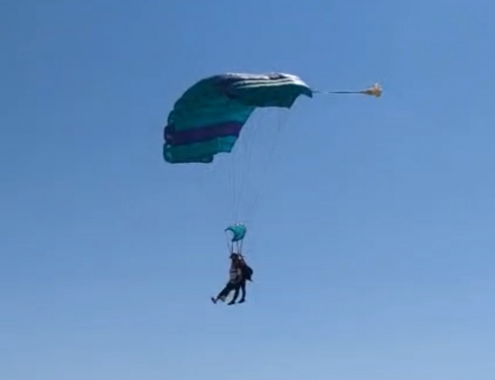 Thirteen individuals completed a 13,000-foot skydive this July to support The Esther Project (image supplied) Thirteen individuals completed a 13,000-foot skydive this July to support The Esther Project (image supplied)
