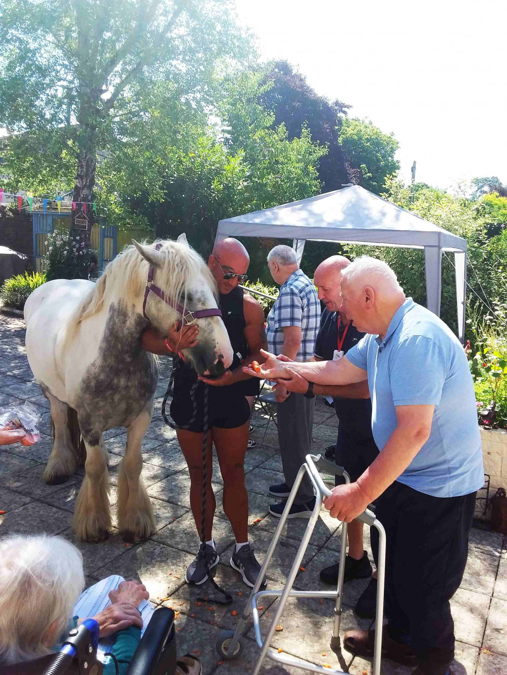 Feeding Bluey at St Cecilia care home Feeding Bluey at St Cecilia care home