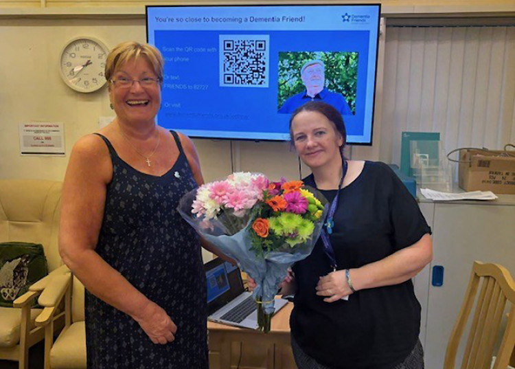 Loraine Coleman (left) presented Deborah Young with flowers by way of thanks for her informative presentation.