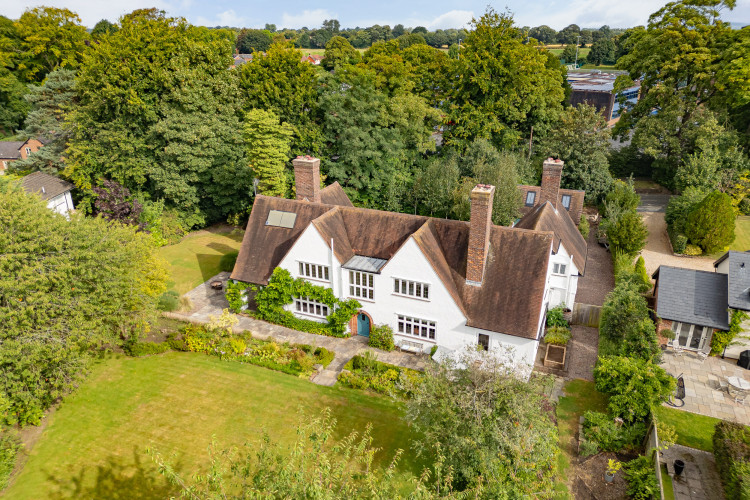Privacy is provided by numerous mature shrubs, hedging and trees (Thornley Groves)