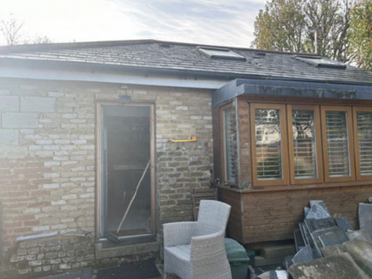 The rear view of the site which could be demolished in place for a new three bedroom home (credit: Planning application).