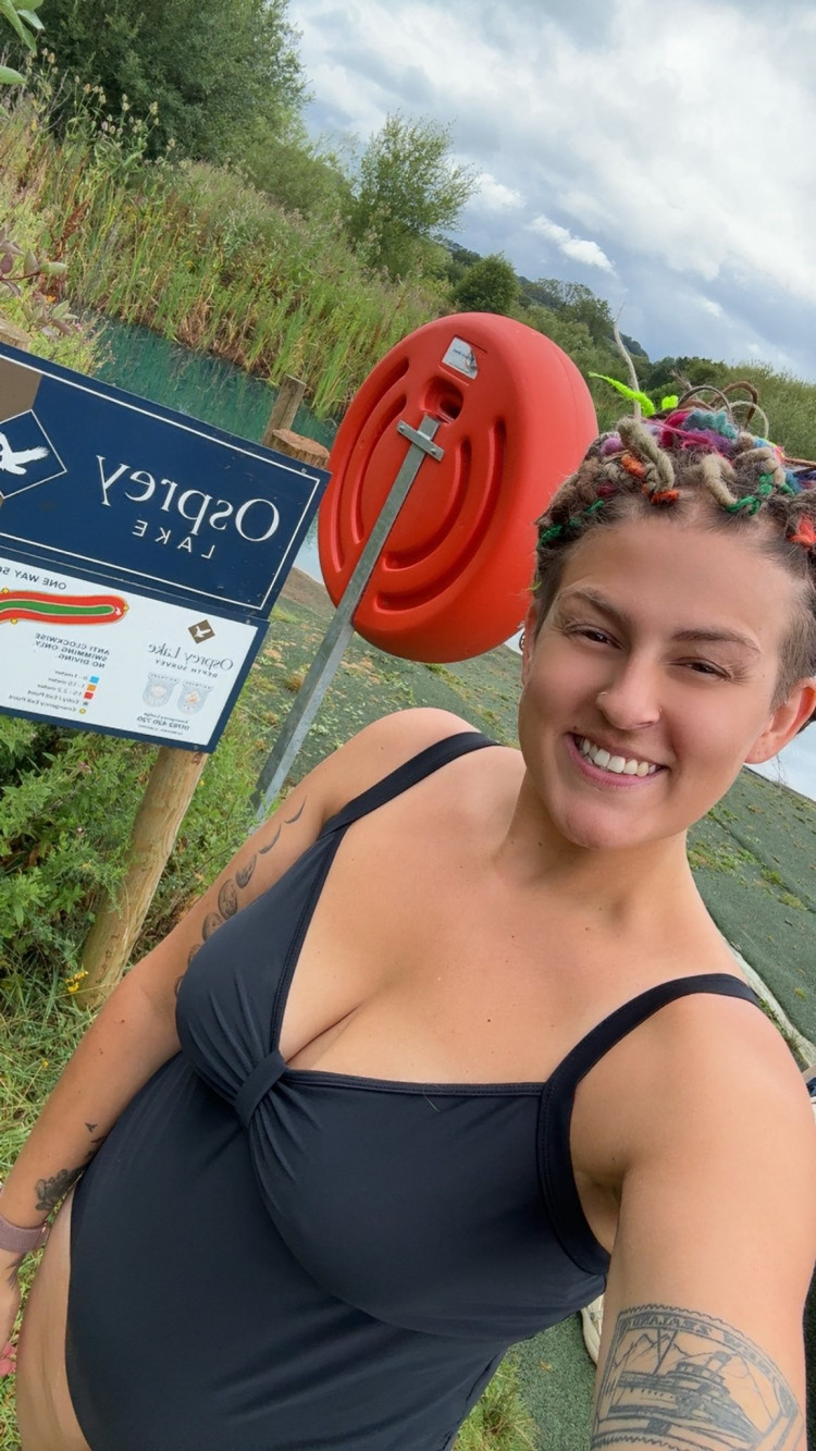 Brave mum-of-two Abigail Phipps completed a 10K wild swimming challenge in July for children battling cancer. (Photo: Abigail Phipps)