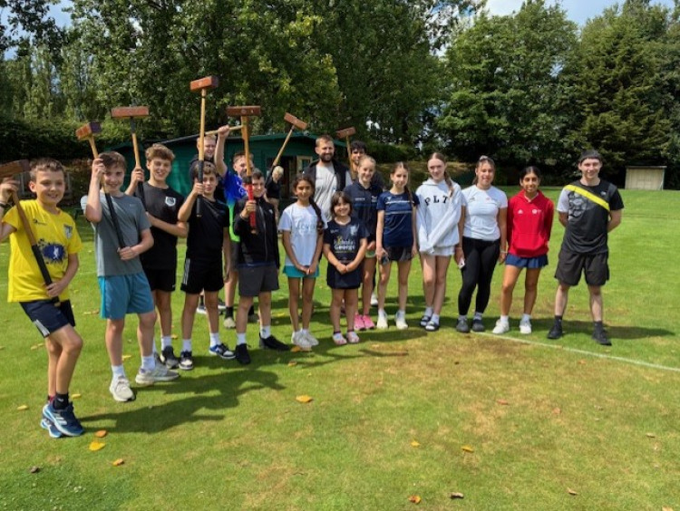 Squash juniors on the croquet lawns at KTSCC
