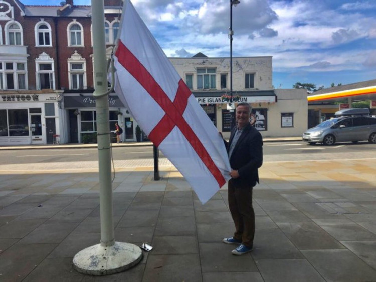 Richmond Council Leader Councillor Gareth Roberts raising the St George's flag outside the Civic Centre (credit: Richmond Council).
