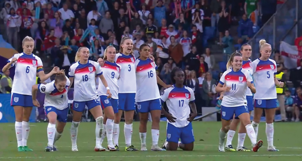 Michelle was on her knees as Chloe Kelly scored the winning penalty. Picture BBC Sport. Michelle was on her knees as Chloe Kelly scored the winning penalty. Picture BBC Sport.
