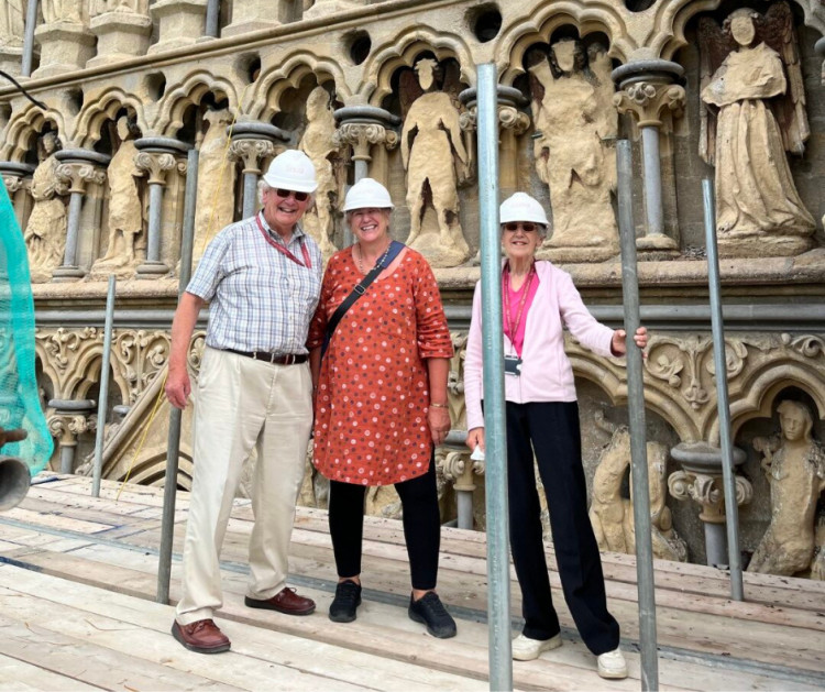 Staff at Wells Cathedral explored its West Front amid conservation work, with archivist Veronica Howe experiencing 13th-century carvings closely. (All photos: Wells Cathedral) 