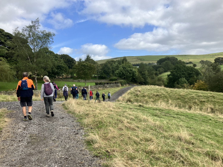 Group of walkers on a trail near Bollington, Cheshire