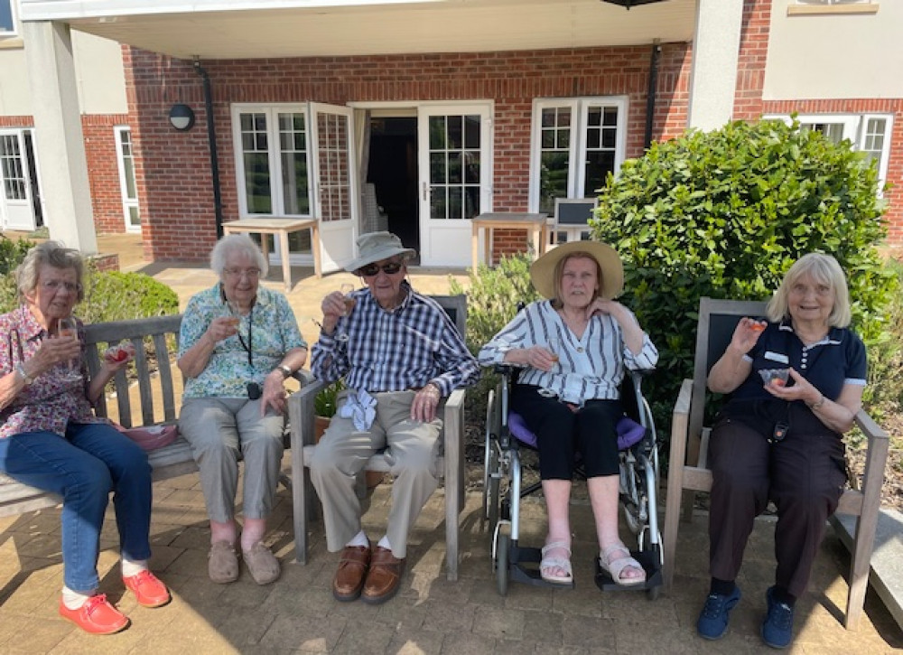 Crandon Springs residents enjoying the sunshine in the home's lovely garden. Crandon Springs residents enjoying the sunshine in the home's lovely garden.