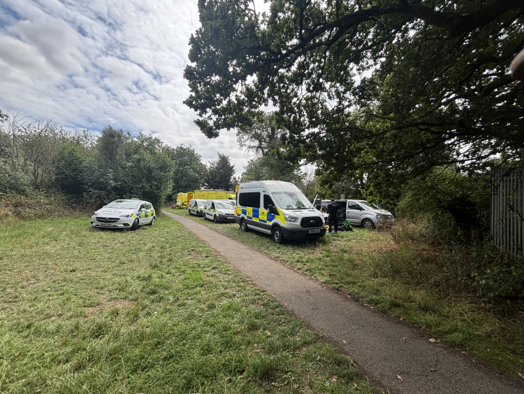 Police at the scene yesterday. 