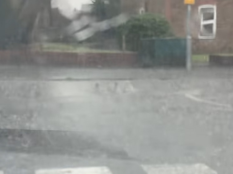 Water forcing its way up through drains in Grays.