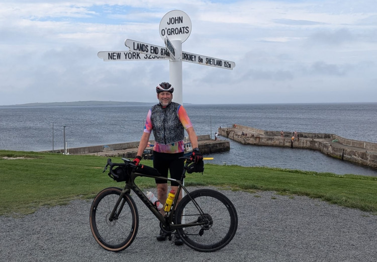 Wells cyclist Chris Hall finishes his marathon fundraising ride for The Lawrence Centre