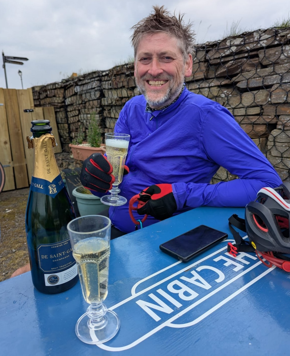 Champagne time for Chris Hall and the smile says “I have done it” Champagne time for Chris Hall and the smile says “I have done it”