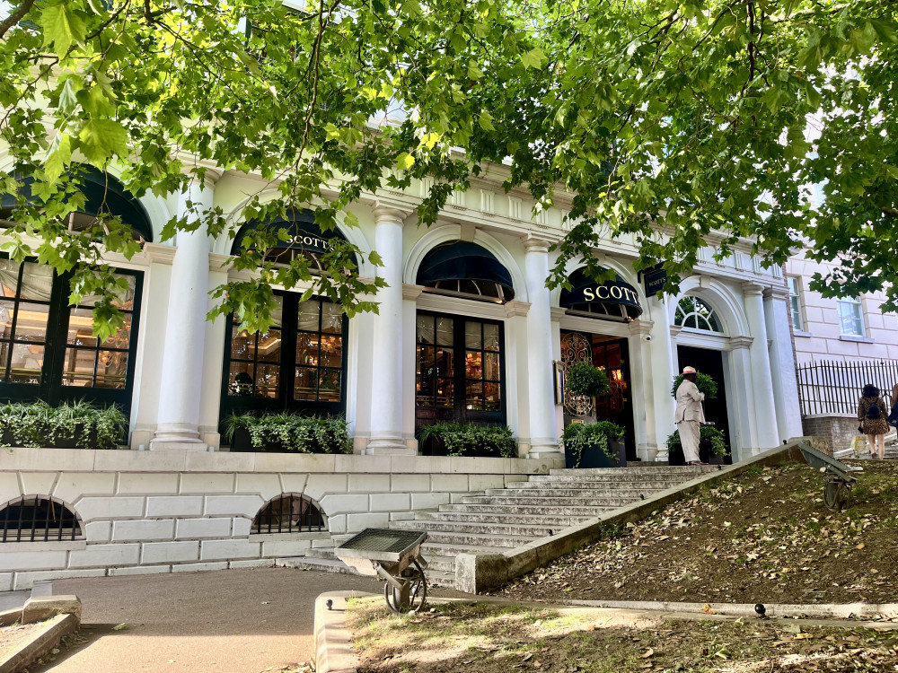 Luxury seafood restaurant Scott’s seeks council approval for polished brass sign and logo flag overlooking the Thames (credit: Planning application). Luxury seafood restaurant Scott’s seeks council approval for polished brass sign and logo flag overlooking the Thames (credit: Planning application).