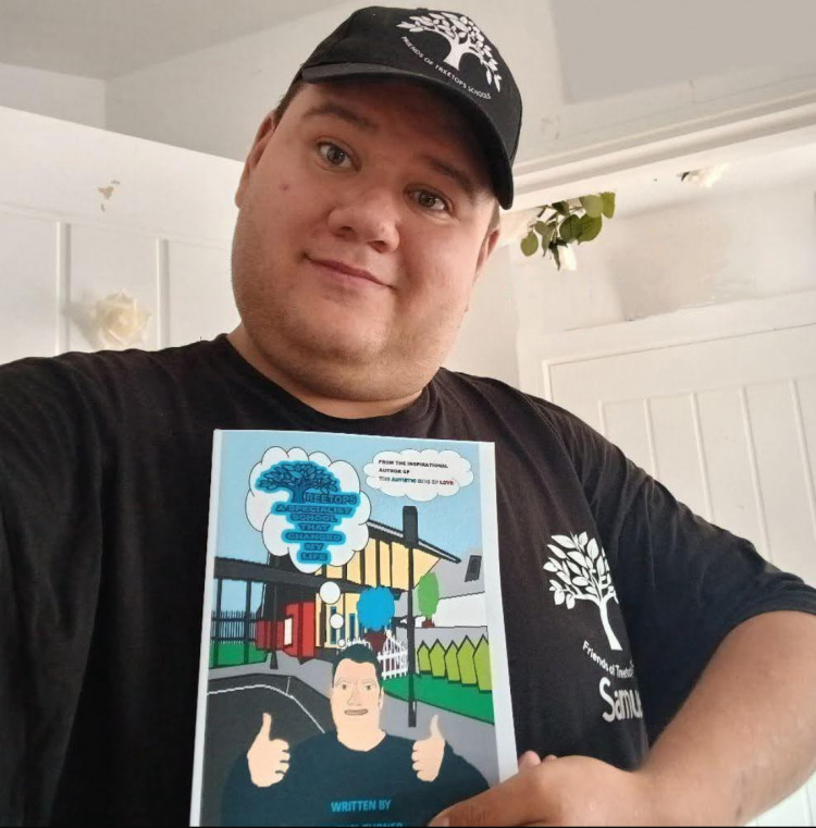 Samuel Turner with his new book. 